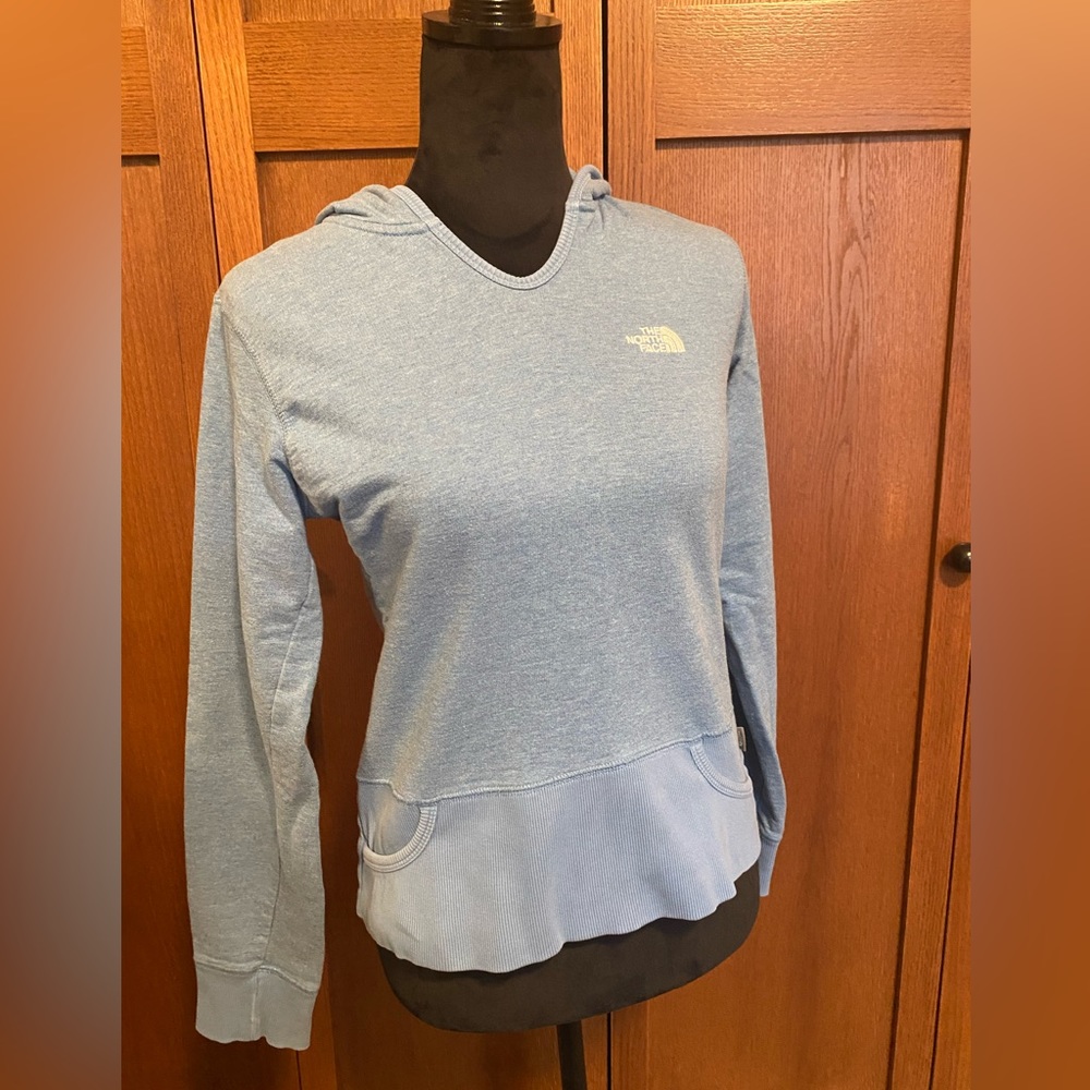 Women’s The North Face fitted hoodie, size medium; blue Heather in color